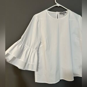 White blouse with flowy sleeves. Size Large